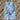 Blue and white striped Pouty Paws dog beach towel with black dog silhouette laid flat on sand
