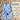 Blue and white striped Pouty Paws dog beach towel on sand, highlighting fast drying and easy packing