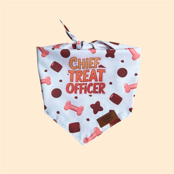Pouty Paws Chief Treat Officer reversible dog bandana front side with treat and bone print